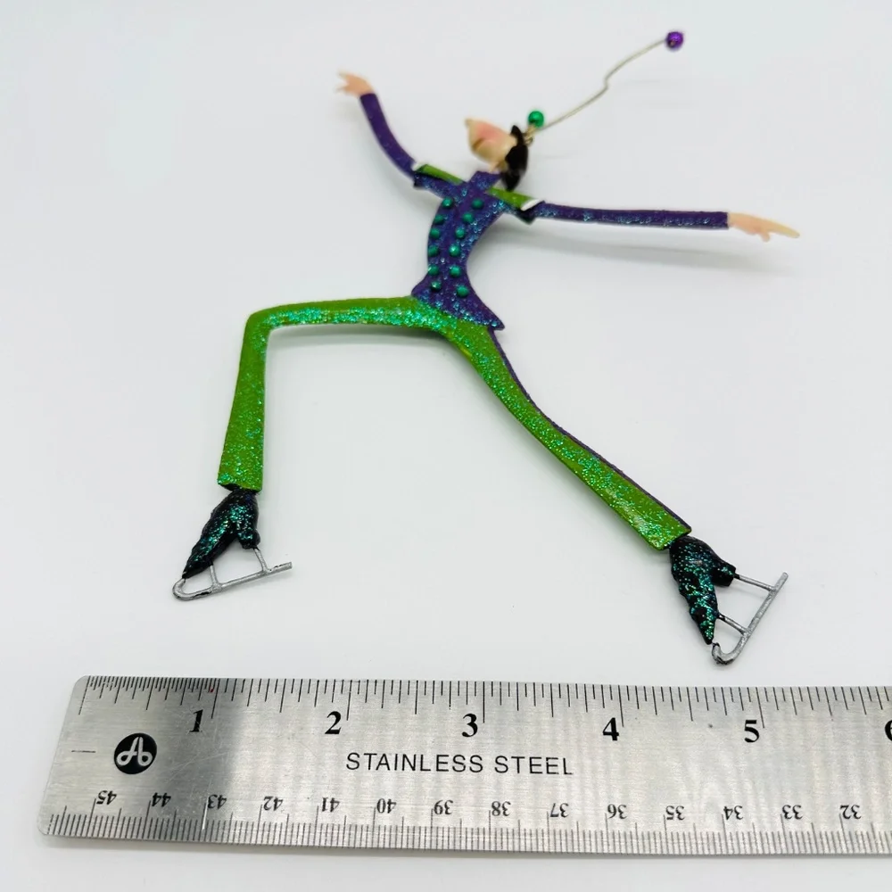 Marquis by Waterford Giddie Guy Gliding Ice Skater Metal Christmas Ornament 2004